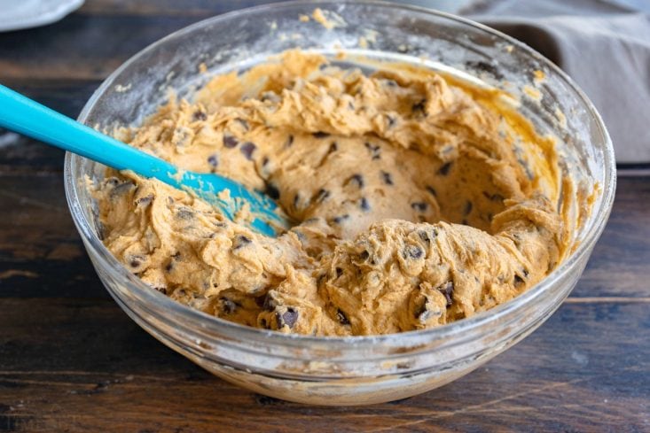 pumpkin cake batter in mixing bowl