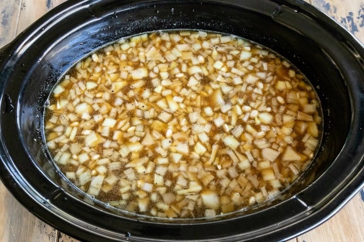 ingredients for crockpot baked beans in slow cooker ready to be cooked