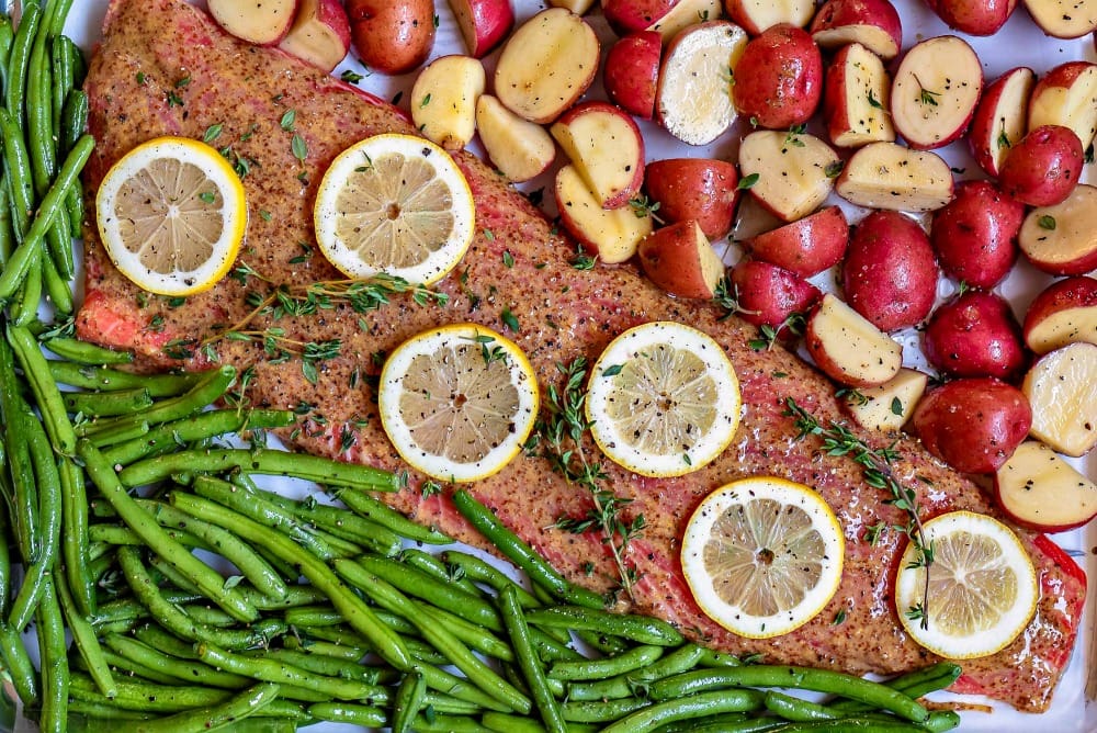 oven baked salmon recipe with honey dijon glaze on sheet pan