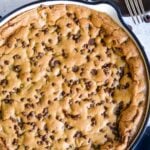 Chocolate Chip Skillet Cookie recipe on white backdrop title