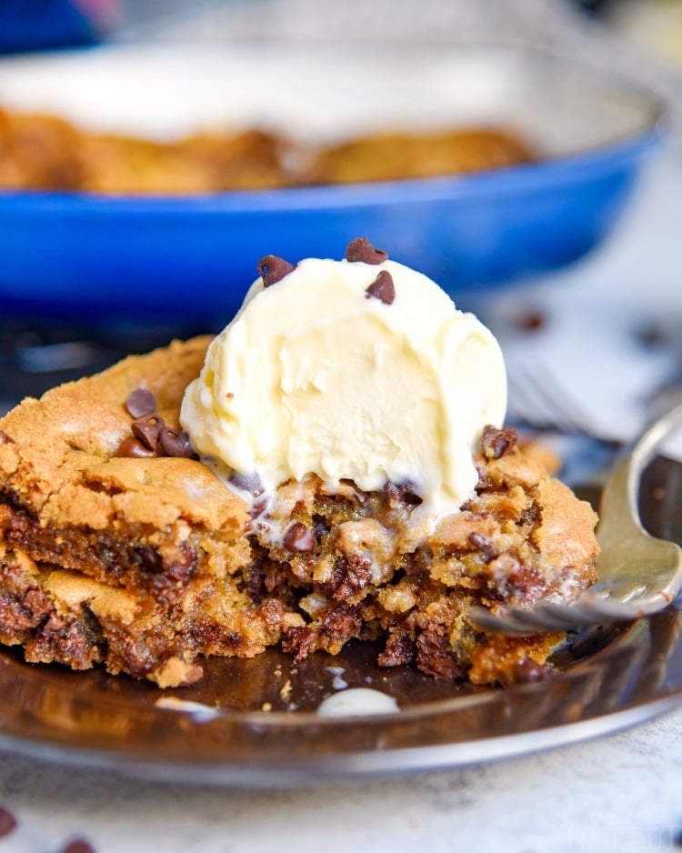 skillet cookie with chocolate chips and ice cream on plate