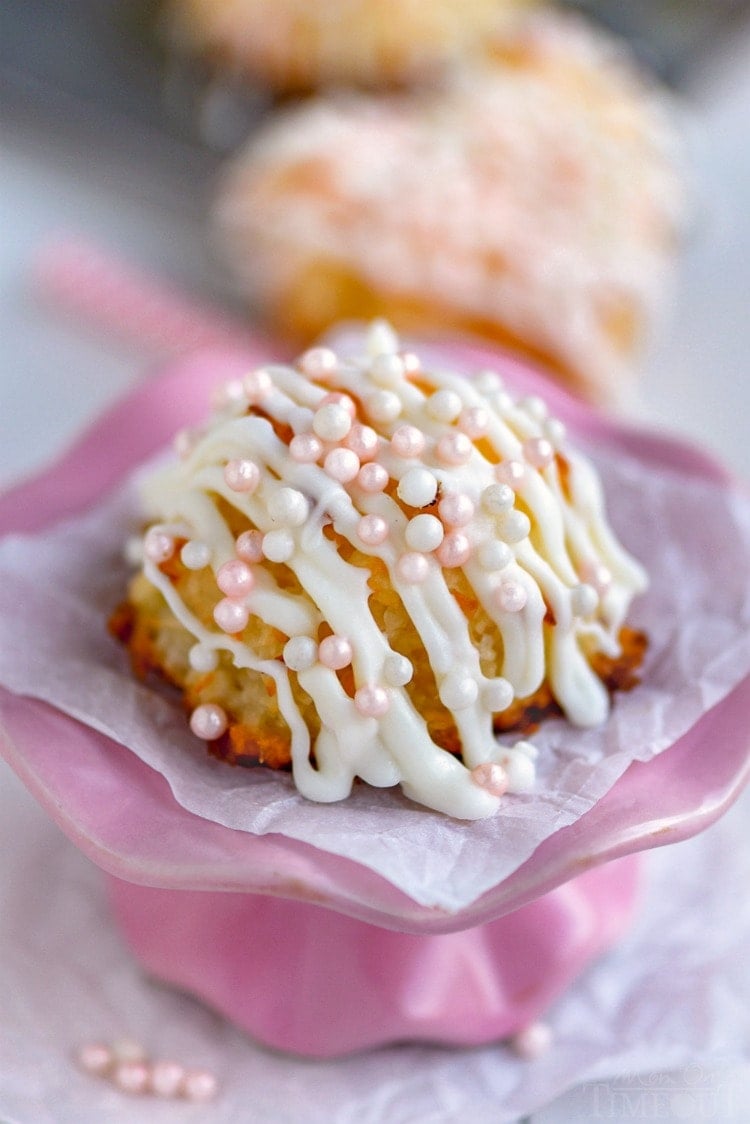 valentines day coconut macaroons with pink pearls on pink cake stand