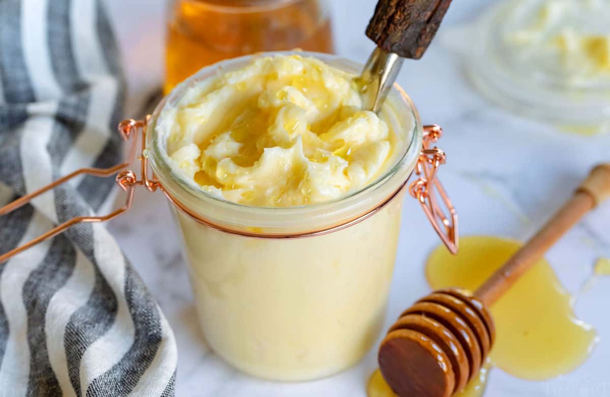 easy honey butter recipe in glass jar with black and white towl