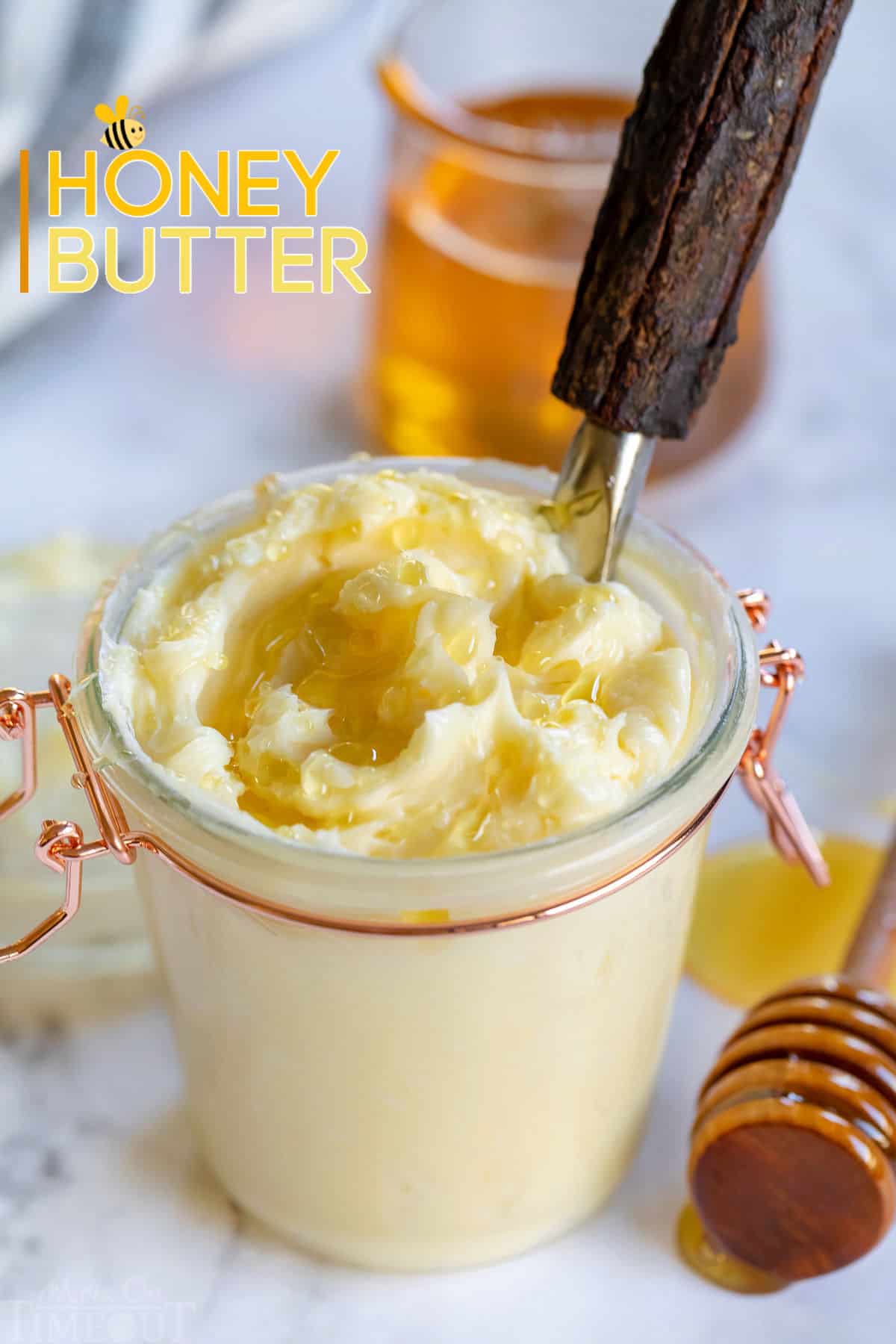 easy honey butter recipe in a glass jar with honey drizzled on top