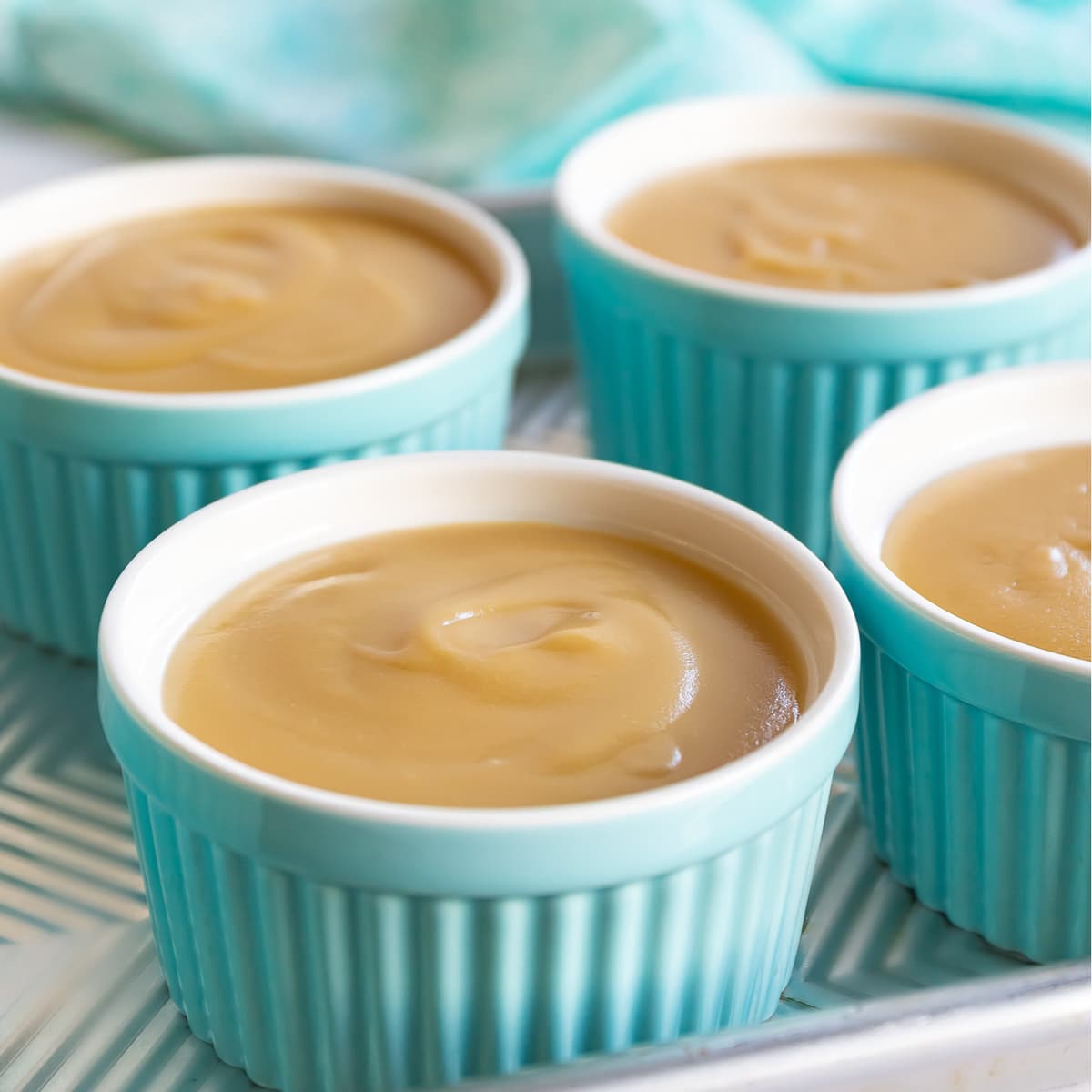 butterscotch pudding recipe four ramekins on baking sheet square