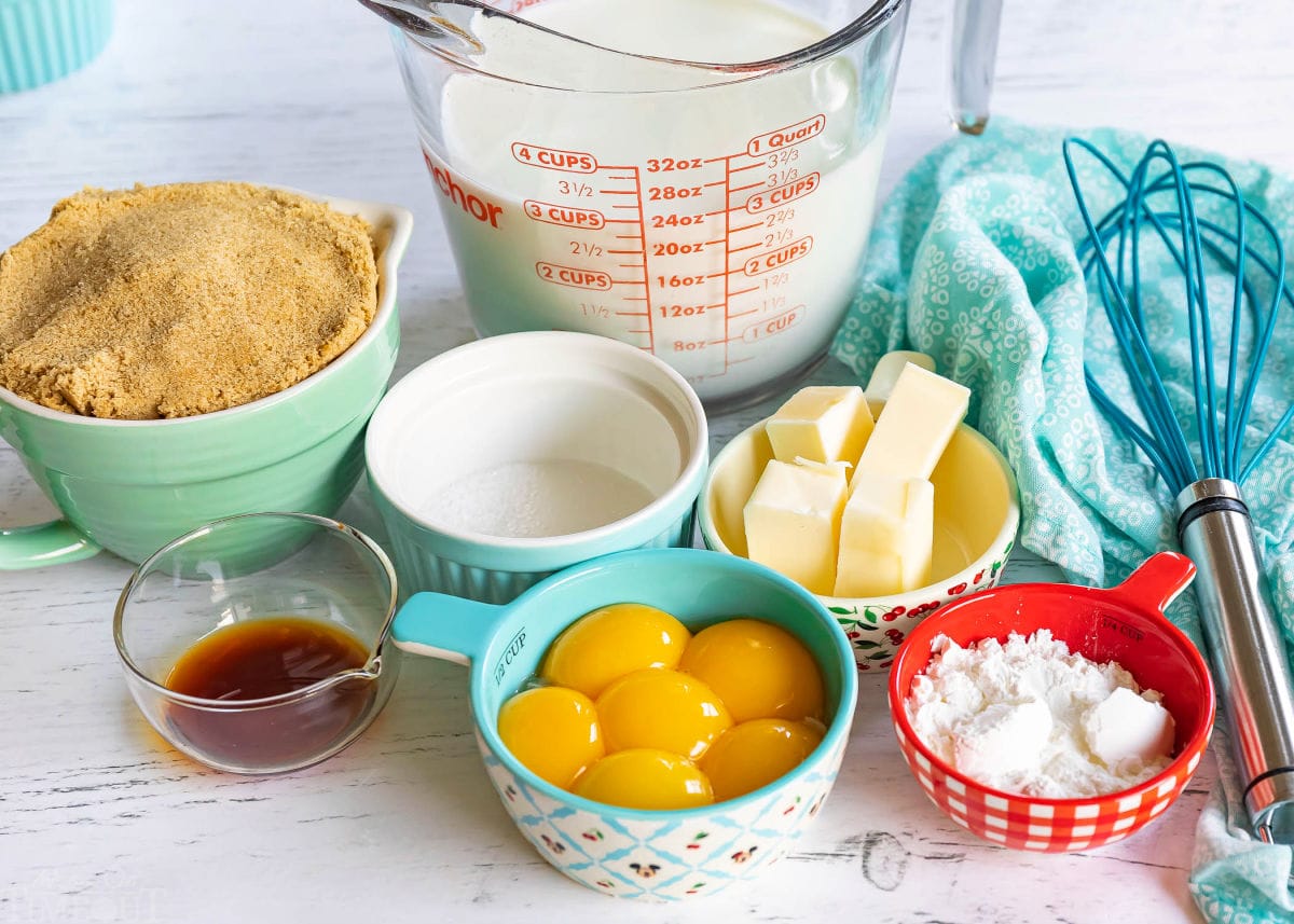 butterscotch pudding recipe ingredients measured out into small containers sitting on a white board