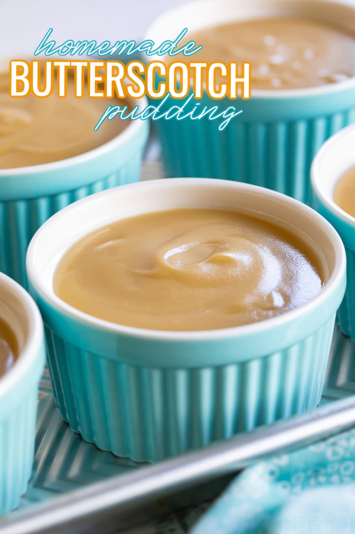 homemade butterscotch pudding recipe in small ramekins on sheet pan