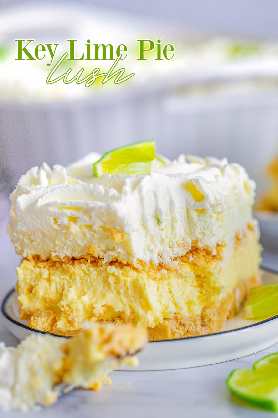 key lime pie lush recipe on plate with bite taken and text overlay