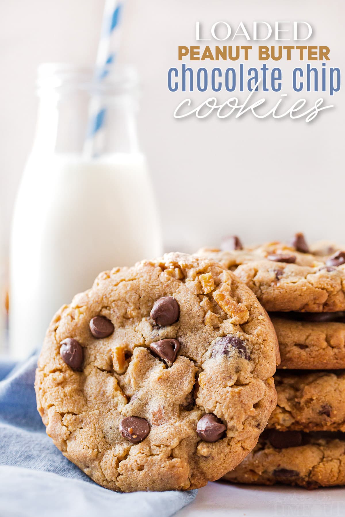 pretzel chocolate chip cookies stacked next to a blue napkin with milk jug in background and one cookie on it's side and text overlay at top