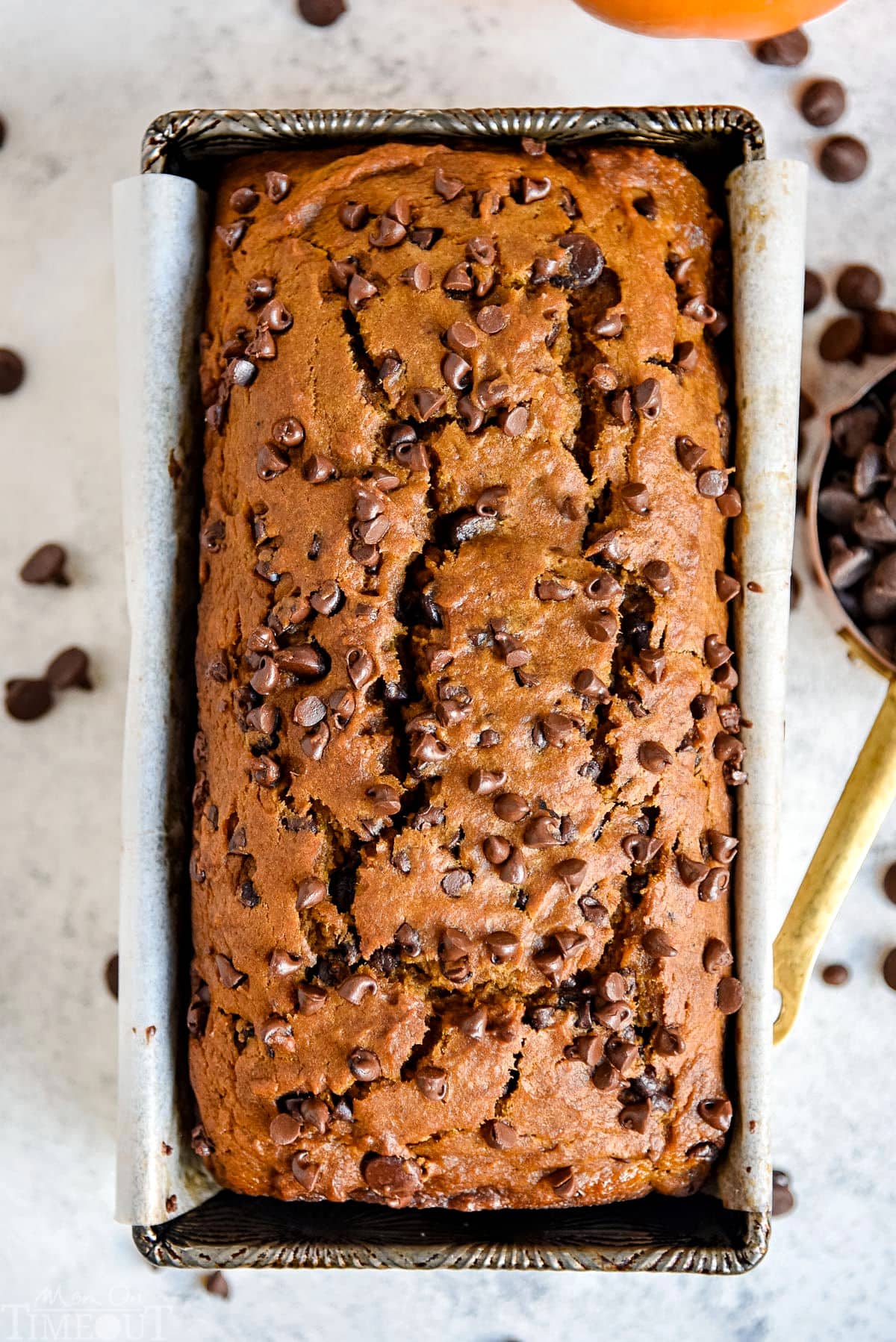 top down view of pumpkin bread still in loaf pan