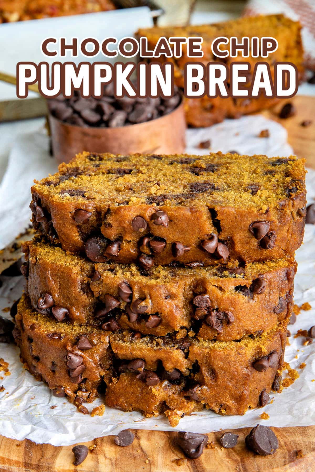 three slices of chocolate chip pumpkin bread stacked on a cutting board with title overlay
