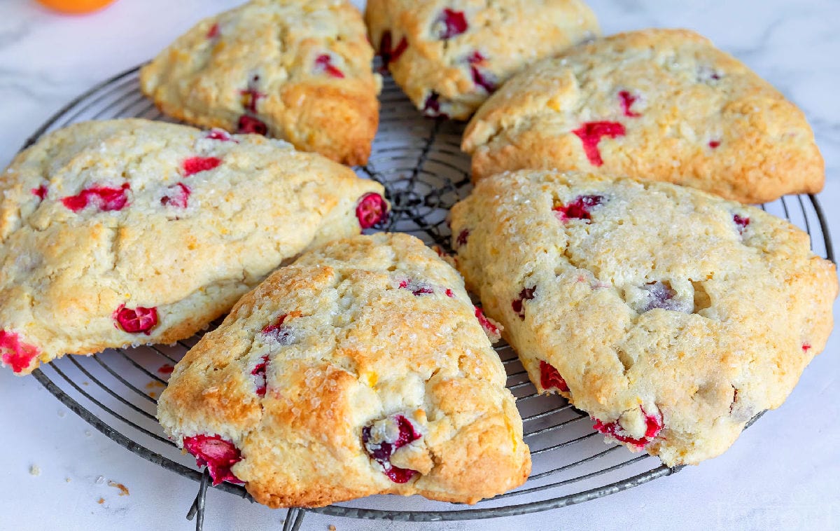 6 cranberry orange scones on cooling rack