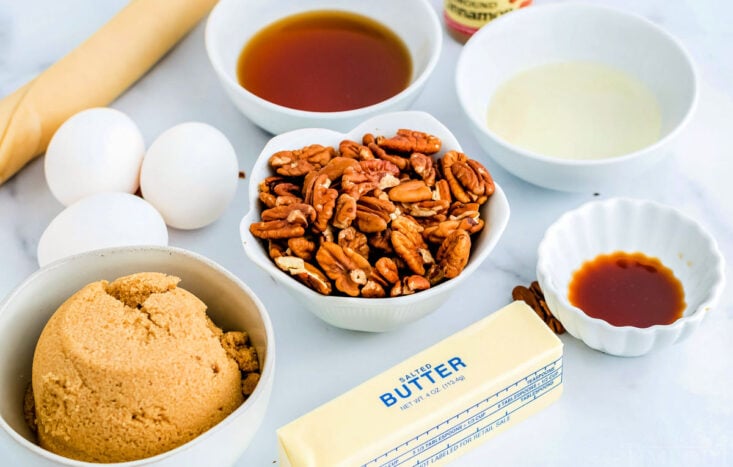 maple pecan pie ingredients measured out into small bowls