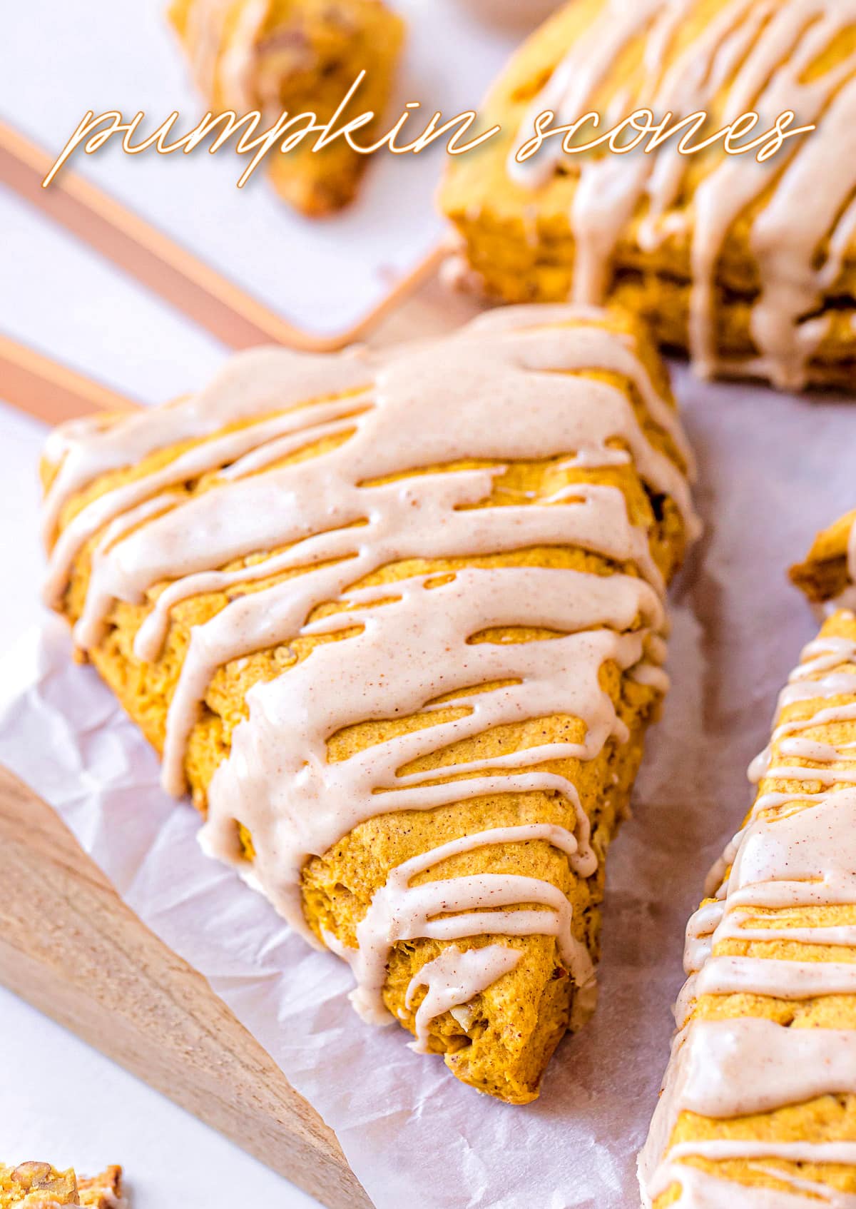 pumpkin scones with maple pumpkin pie spice drizzle on top and title overlay at top of the image