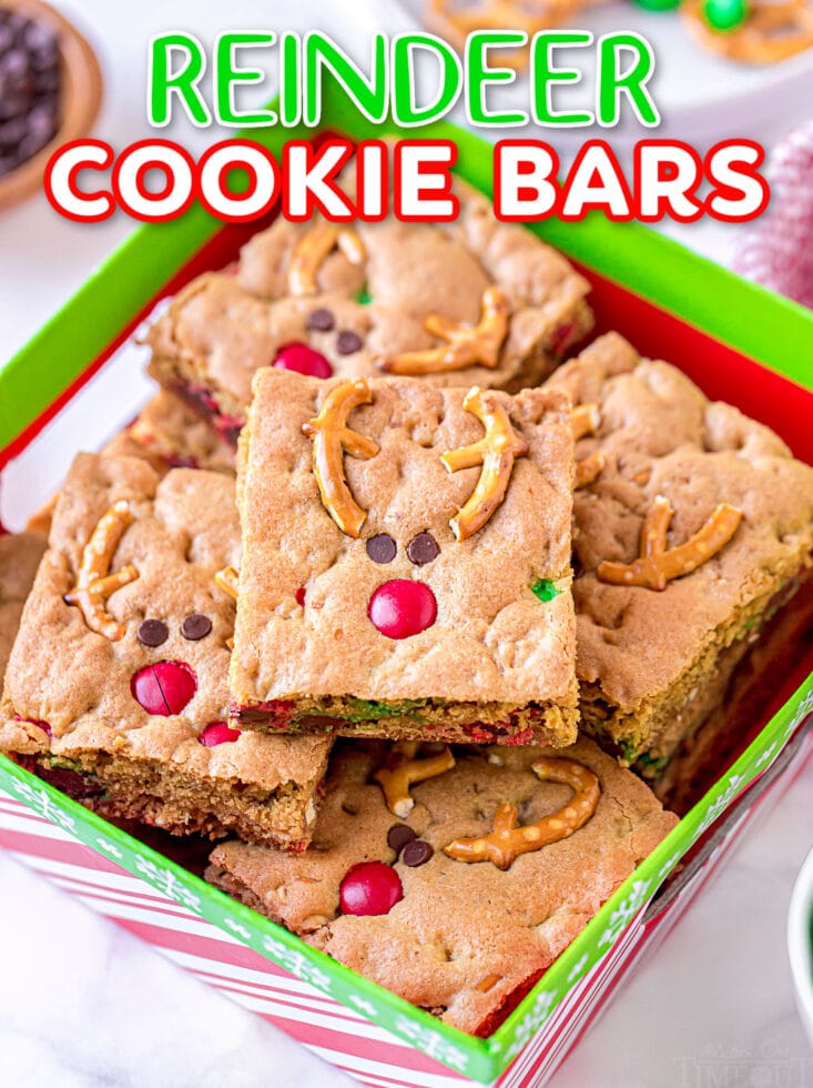 cookie bars stacked in red and green christmas box with title overlay at the top of the image