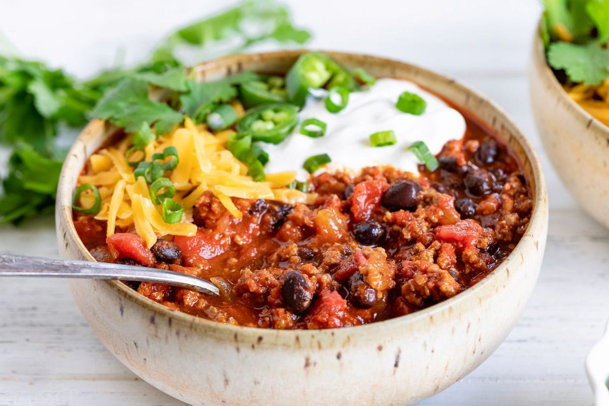 spoonful of turkey chili in bowl.