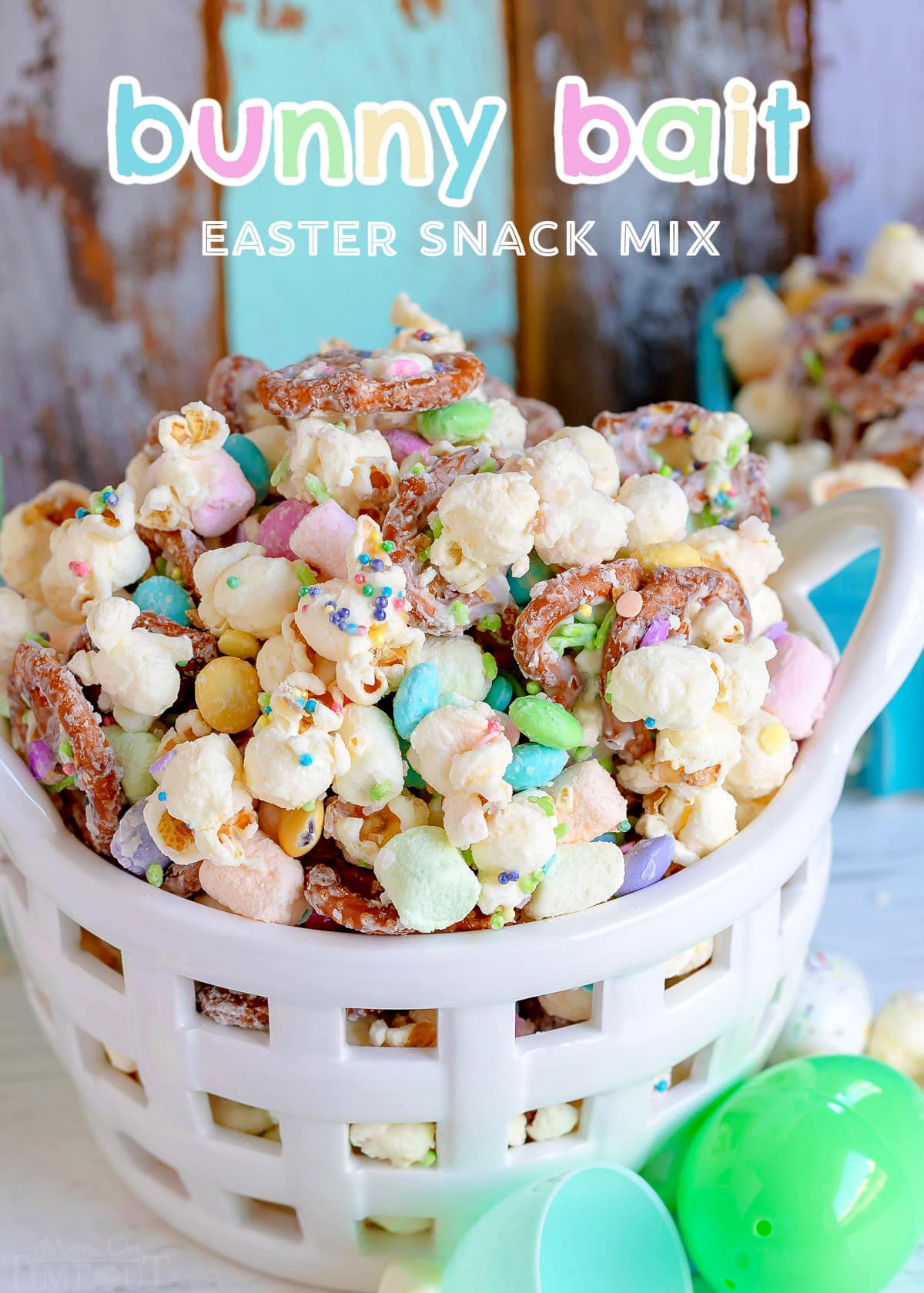 easter snack mix in white basket with title overlay at top of image.