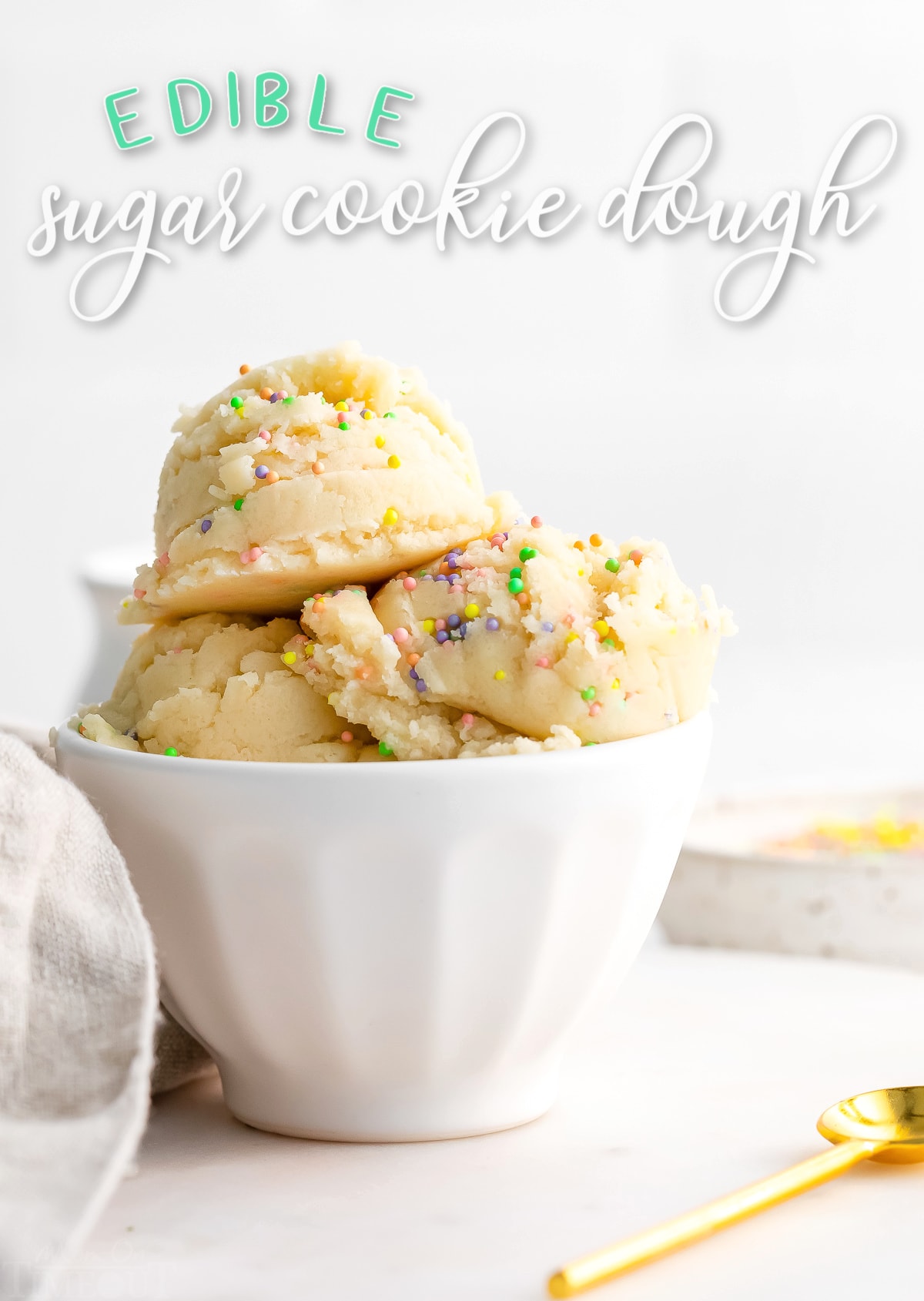 edible sugar cookie dough in small white bowl with sprinkles on top. title overlay at top of image.