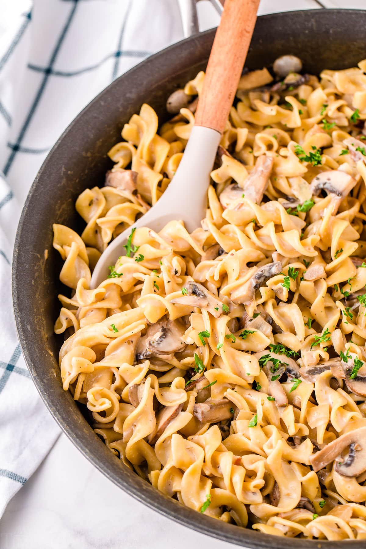 mushroom stroganoff ready to serve in skillet.