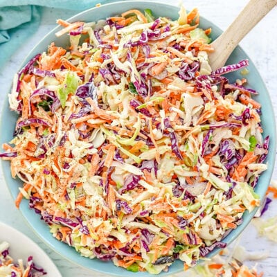 Cole slaw in blue bowl ready to serve.