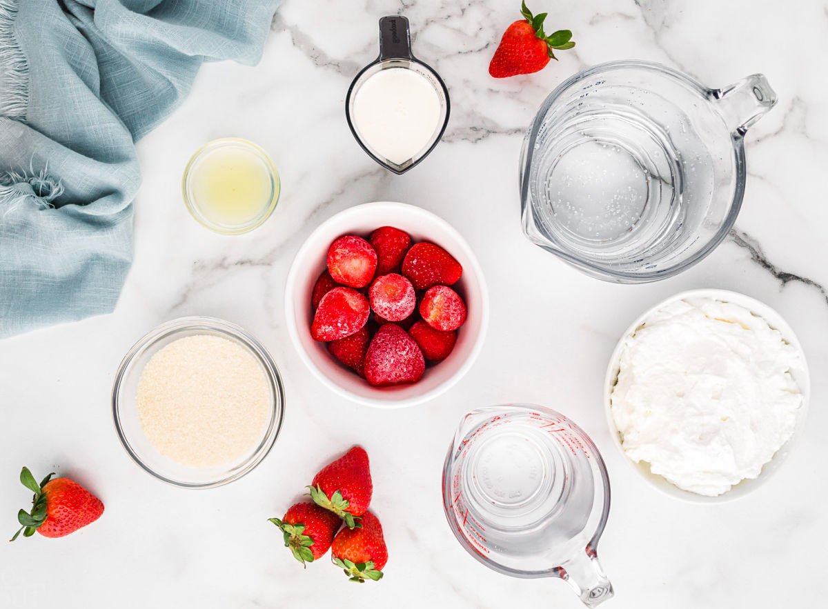 italian soda ingredients measured out and ready to use sitting on marble surface.