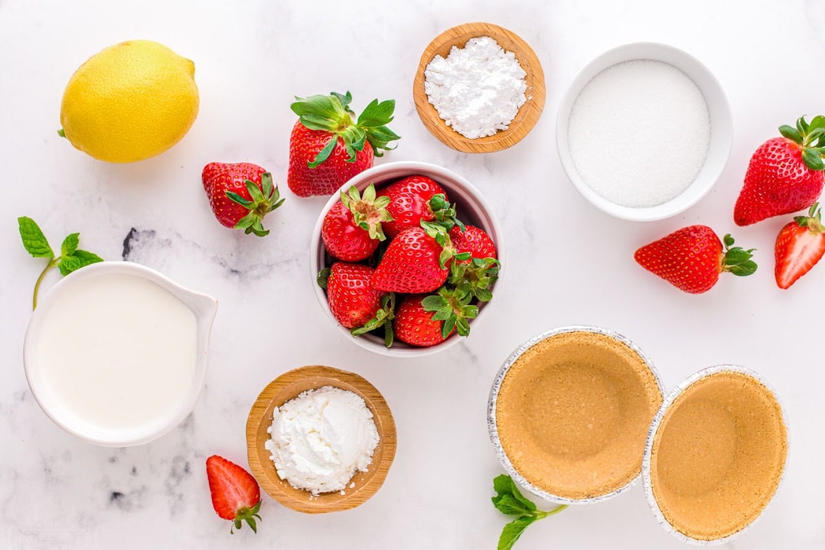 strawberry pie ingredients measured out into small bowls and ready to use.