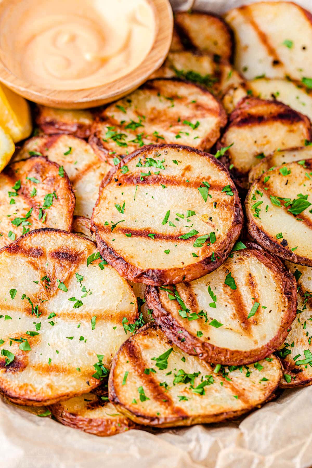 potatoes with grill marks cut into slices.