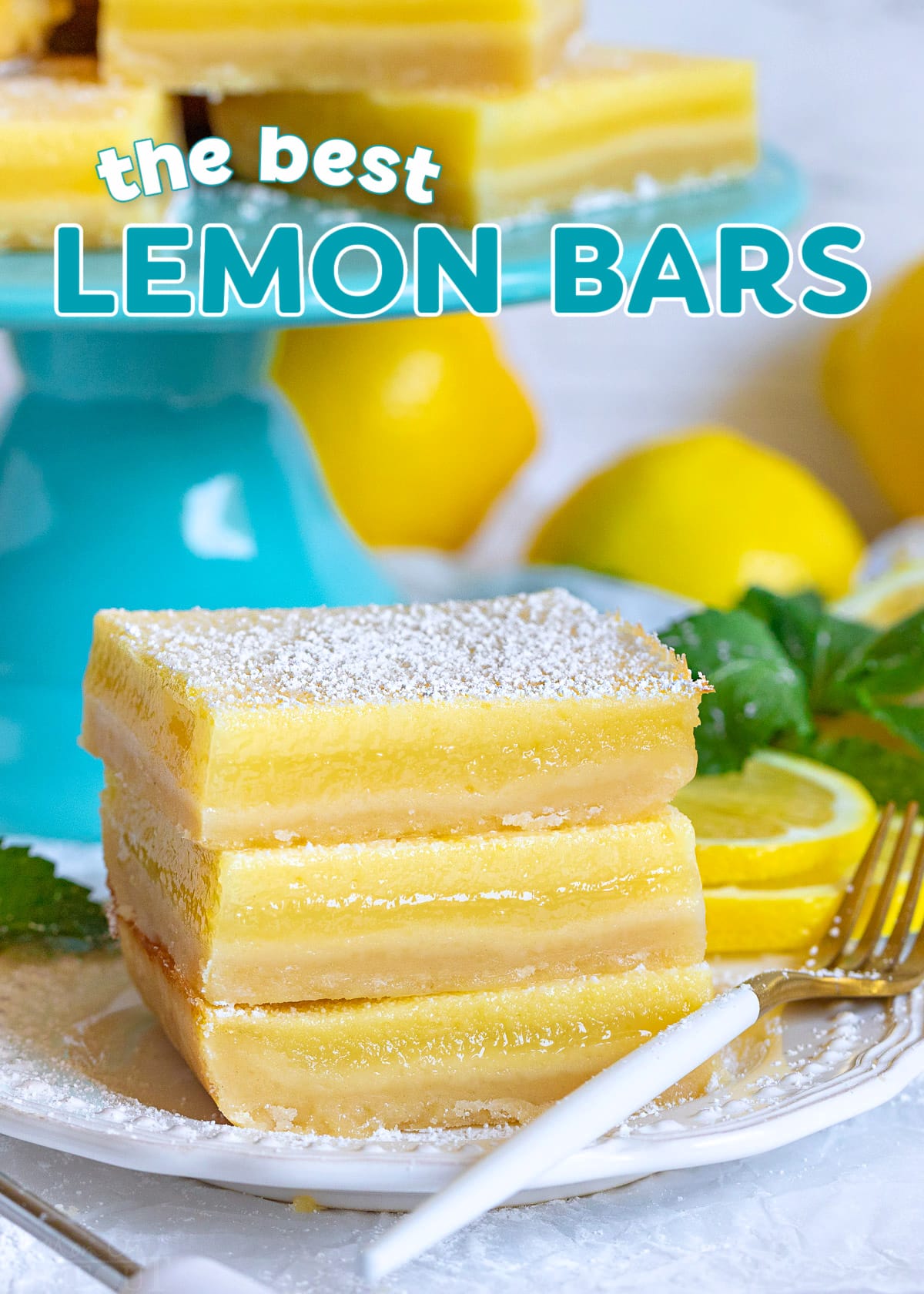 lemon bars stacked three high on white plate in front of teal cake stand with more lemon bars. title overlay at top of image.