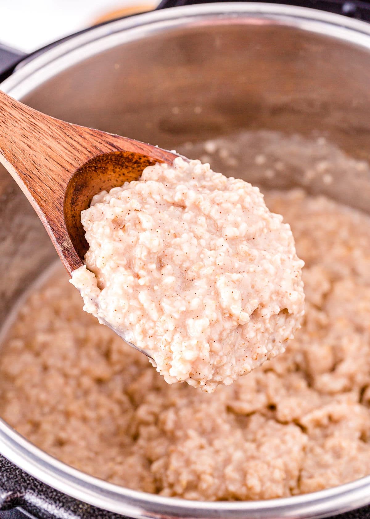spoonful of thick and creamy steel cut oats.