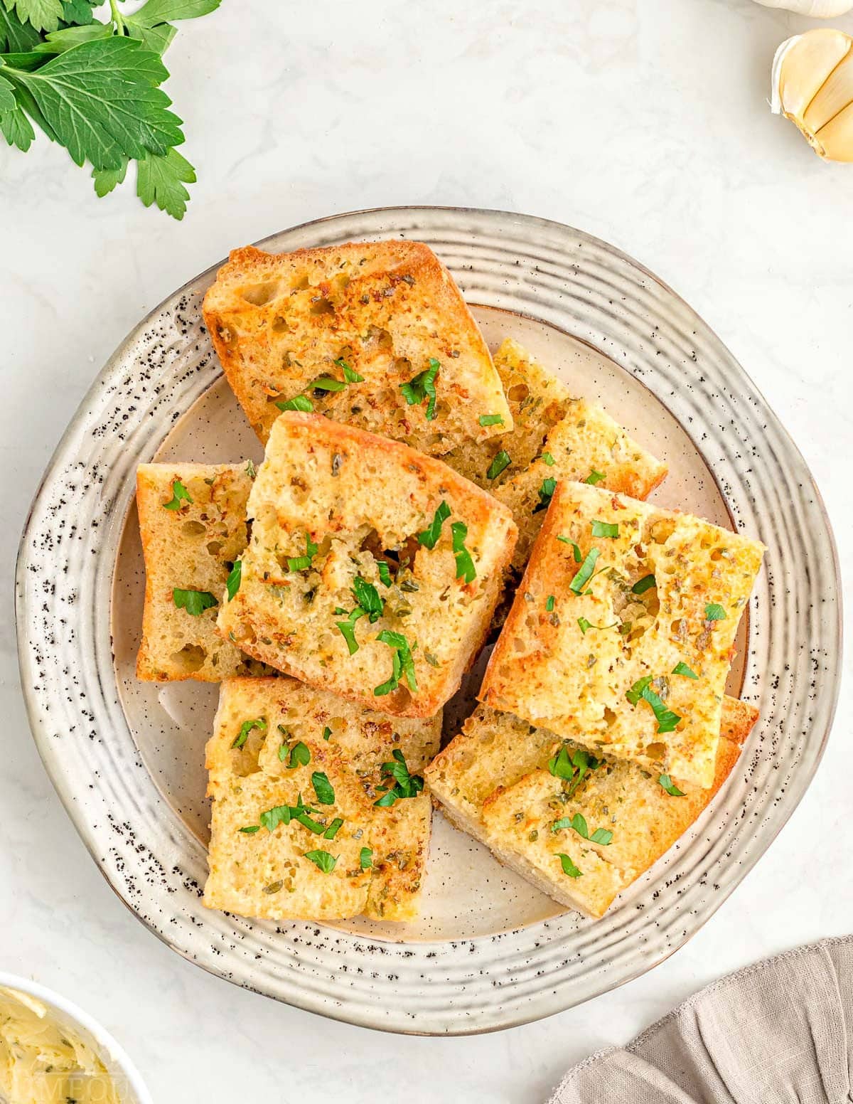 top down look at plate with garlic bread made in air fryer.