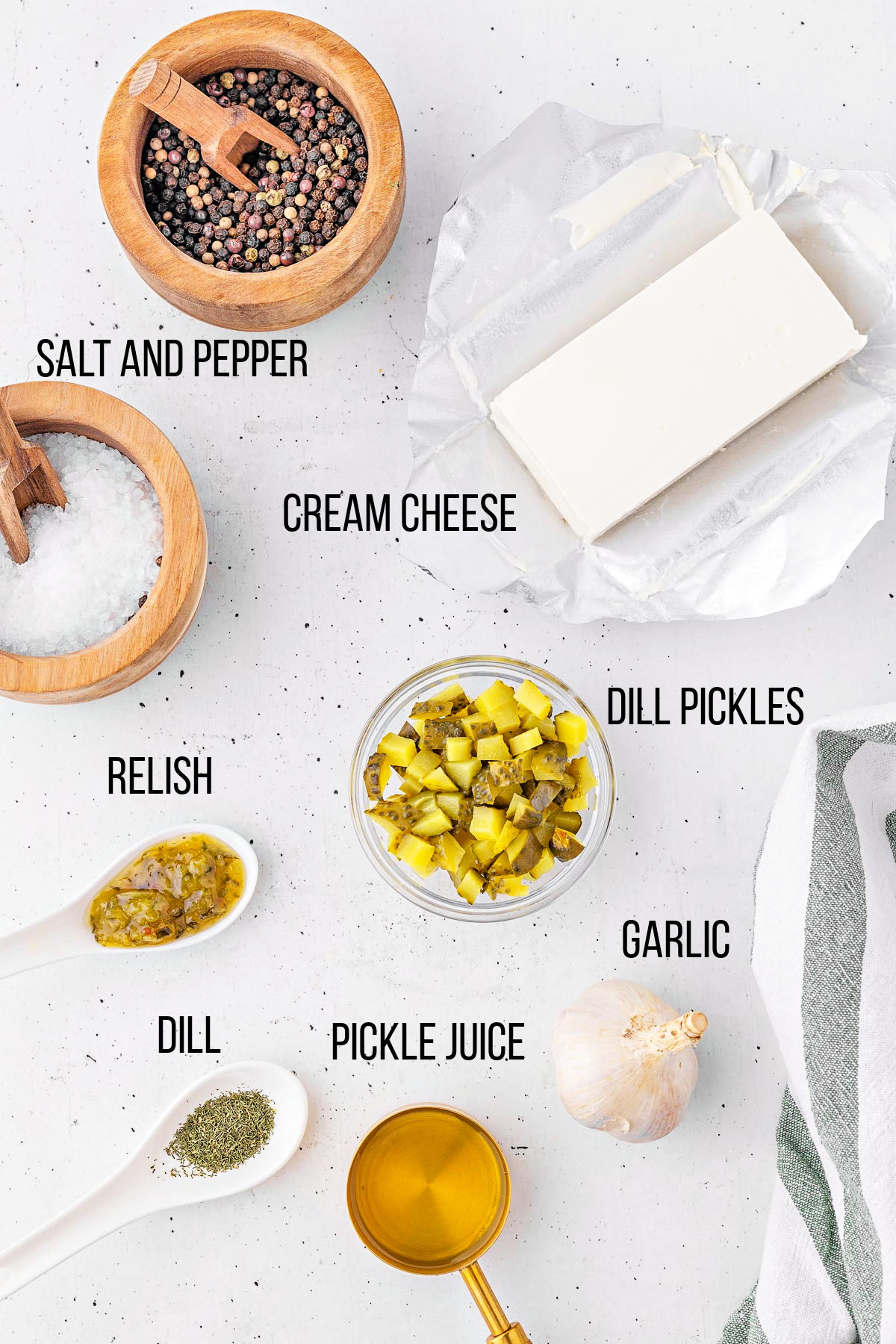 pickle dip ingredients laid out and measured. ready to mix together for the dip recipe.