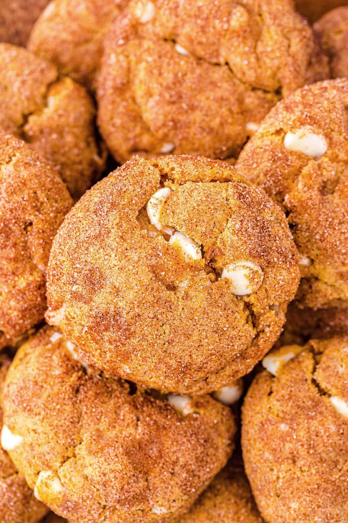 close up look at a stack of pumpkin snickerdoodle cookies.