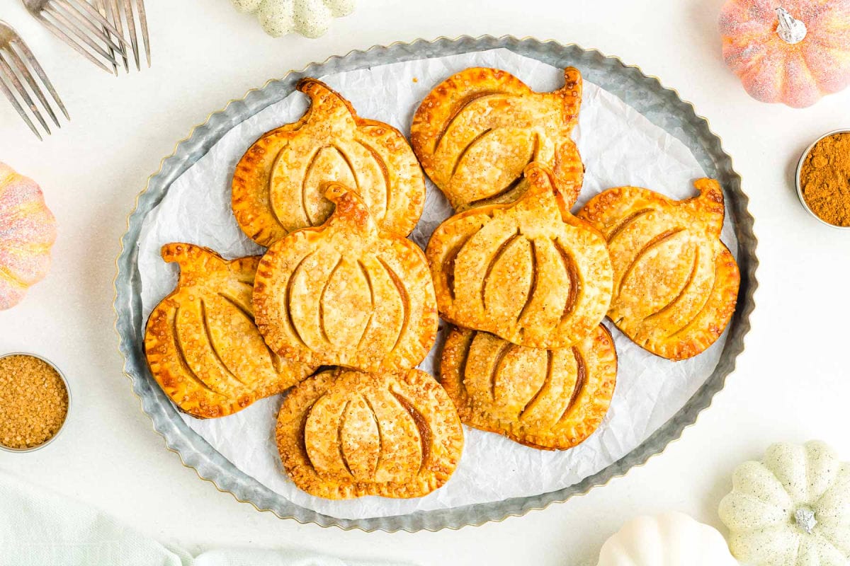 top down view of hand pies on a metal platter all artfully arranged and ready to be enjoyed.