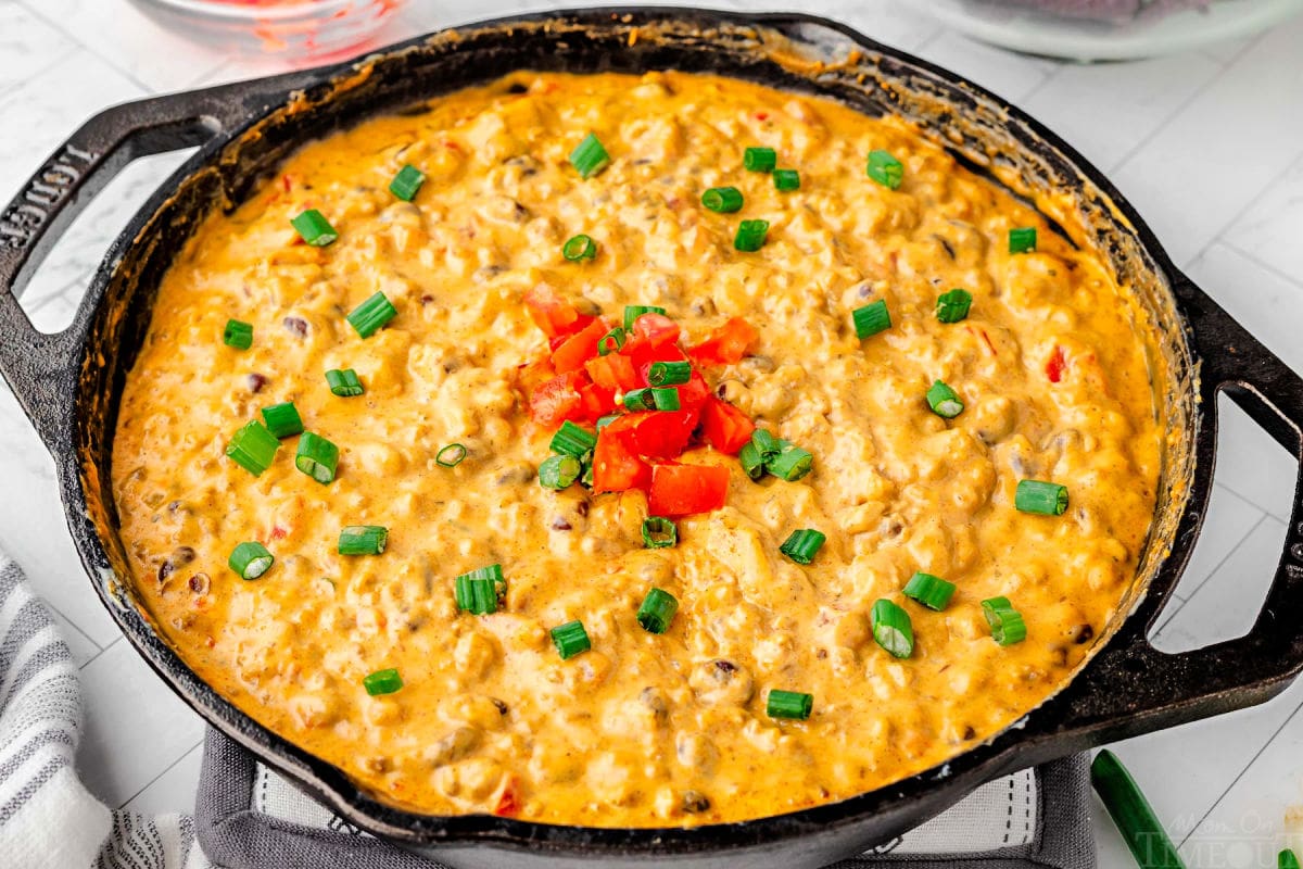 rotel dip in a black cast iron skillet.