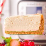 one slice of instant pot cheesecake being held above the rest of the cheesecake in front of an instant pot.