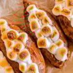 Close up shot of twice baked sweet potatoes on a piece of parchment paper.