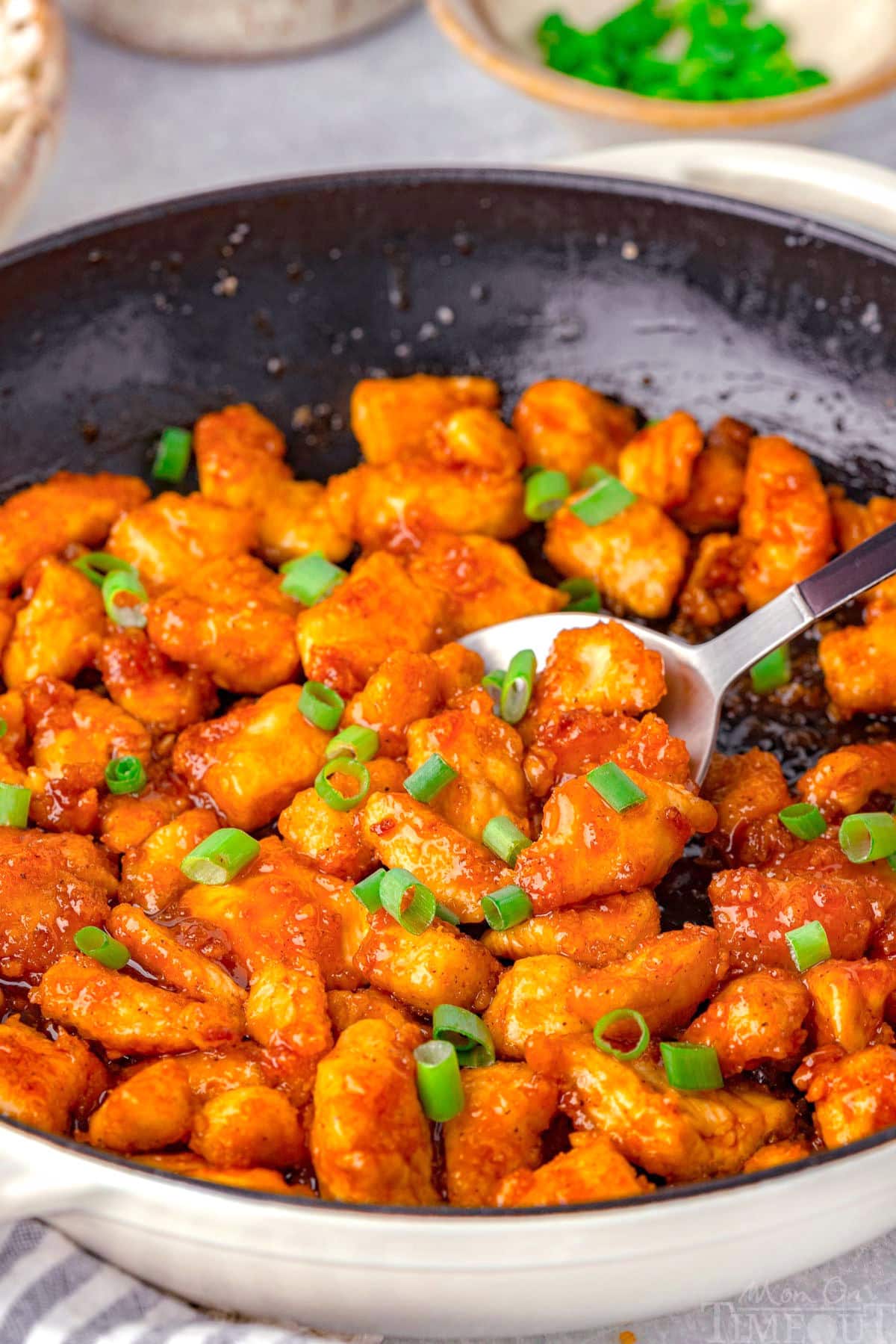 Skillet with Firecracker Chicken recipe in it ready to be served.