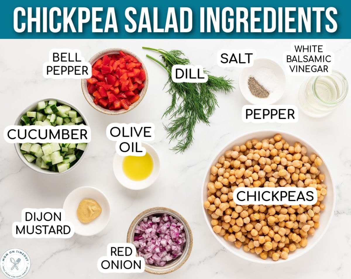 Overheat shot of ingredients for Chickpea Salad measured out into small bowls and ready to be used in the recipe. Text title at top of image.