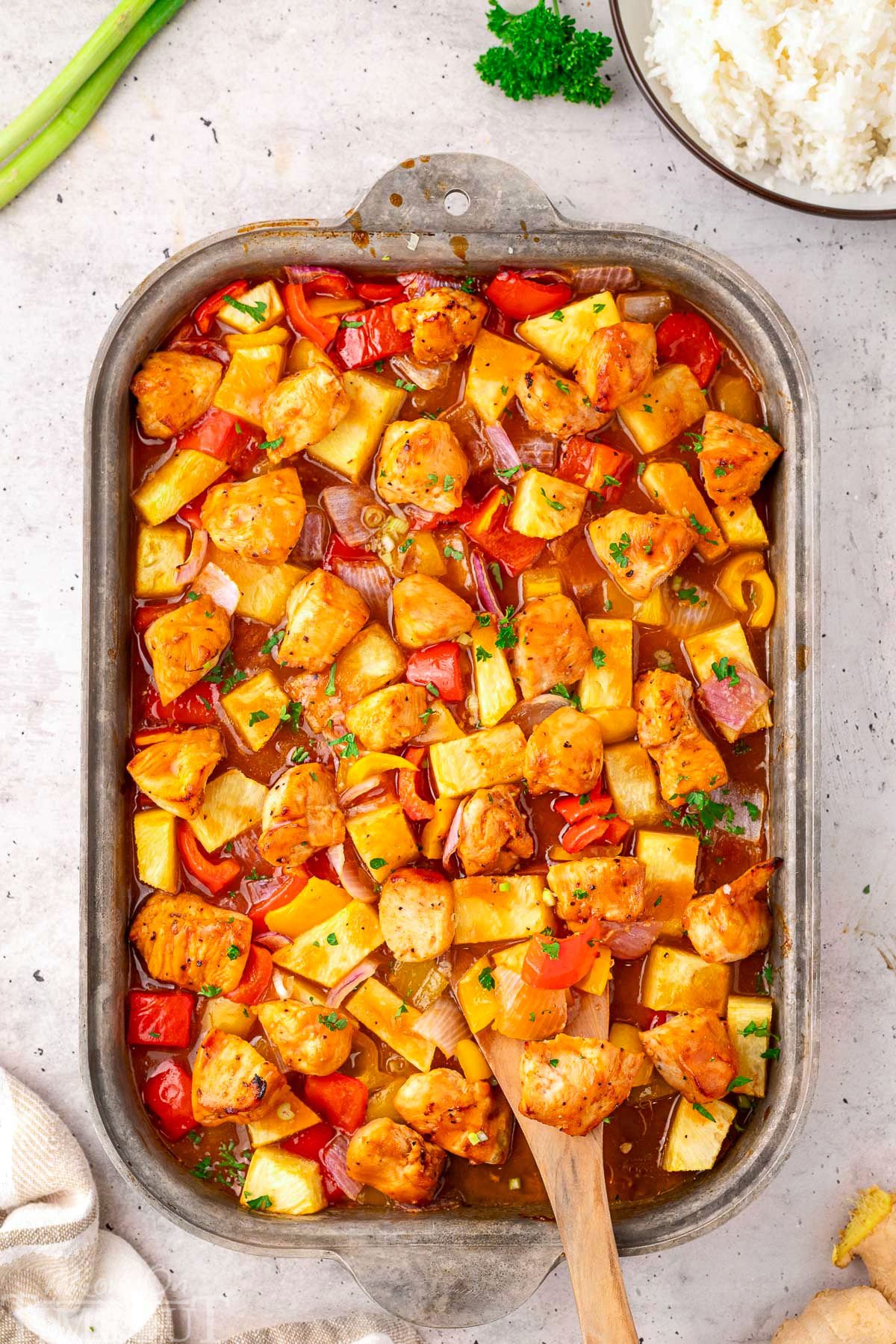 Overhead view of Hawaiian Chicken sheet pan recipe still in the sheet pan ready to be served.