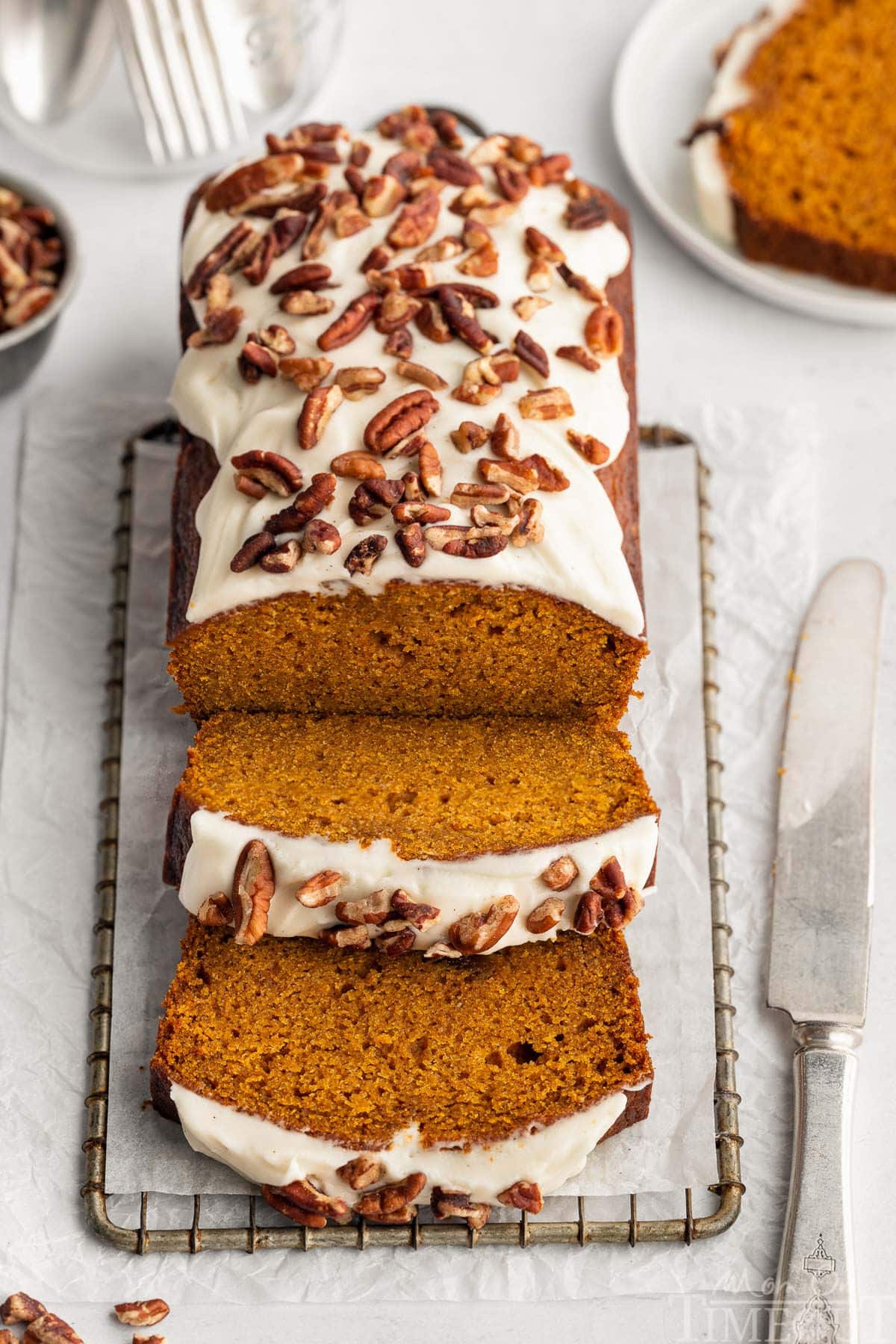Top down look at pumpkin loaf with two slices cut.