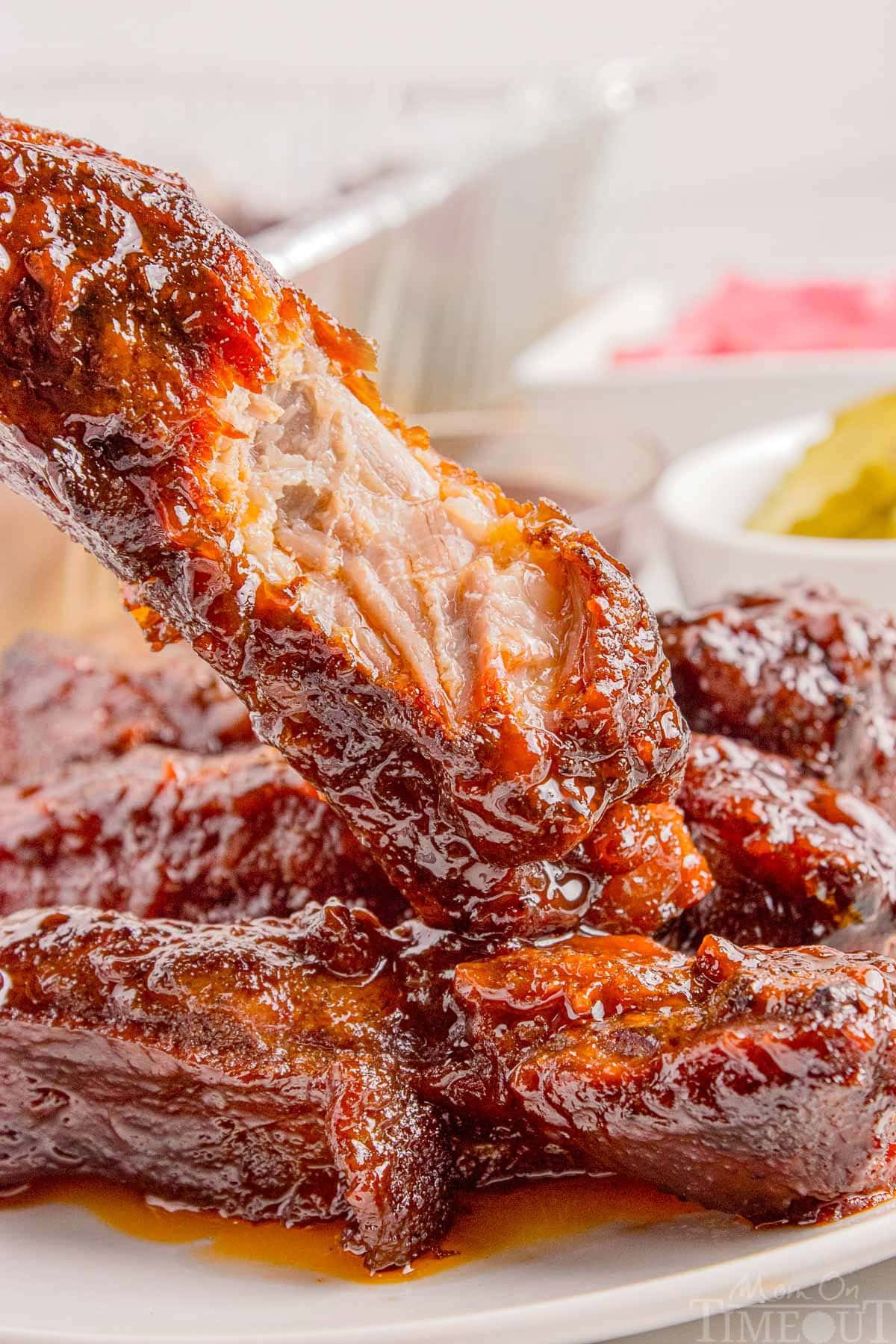 St Louis Pork Ribs with bite taken out of it. on plate.