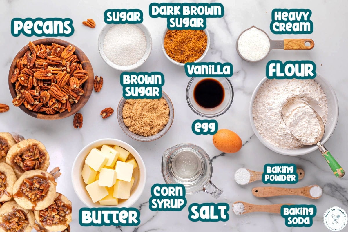 Overhead shot of pecan pie cookies ingredients laid out and ready to be used in the recipe. Each ingredient is labeled.