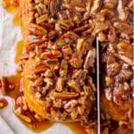 Overhead view of sticky bun being cut away from the remaining buns on a parchment lined cutting board.
