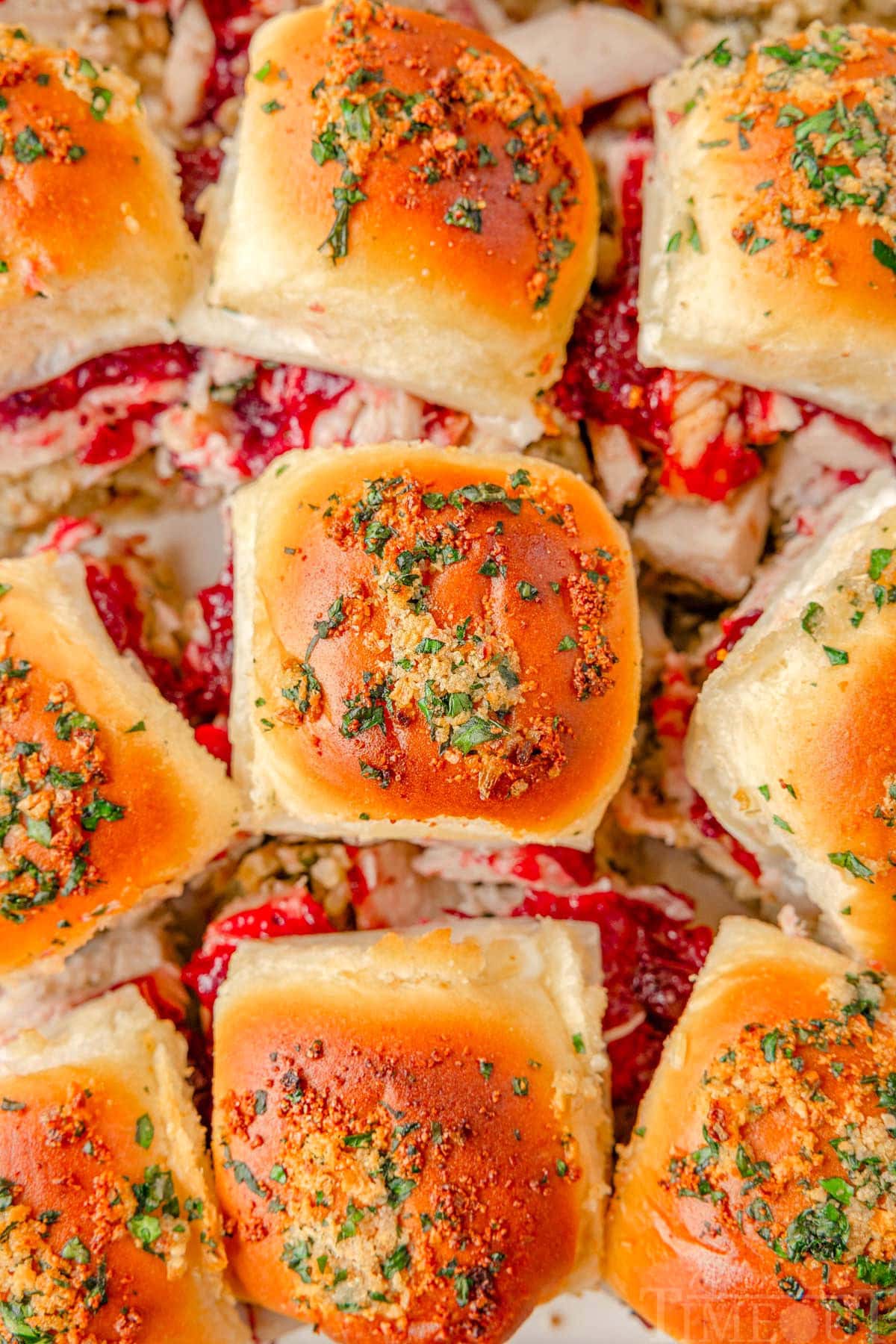 Close up shot of turkey sliders baked and ready to be eaten.