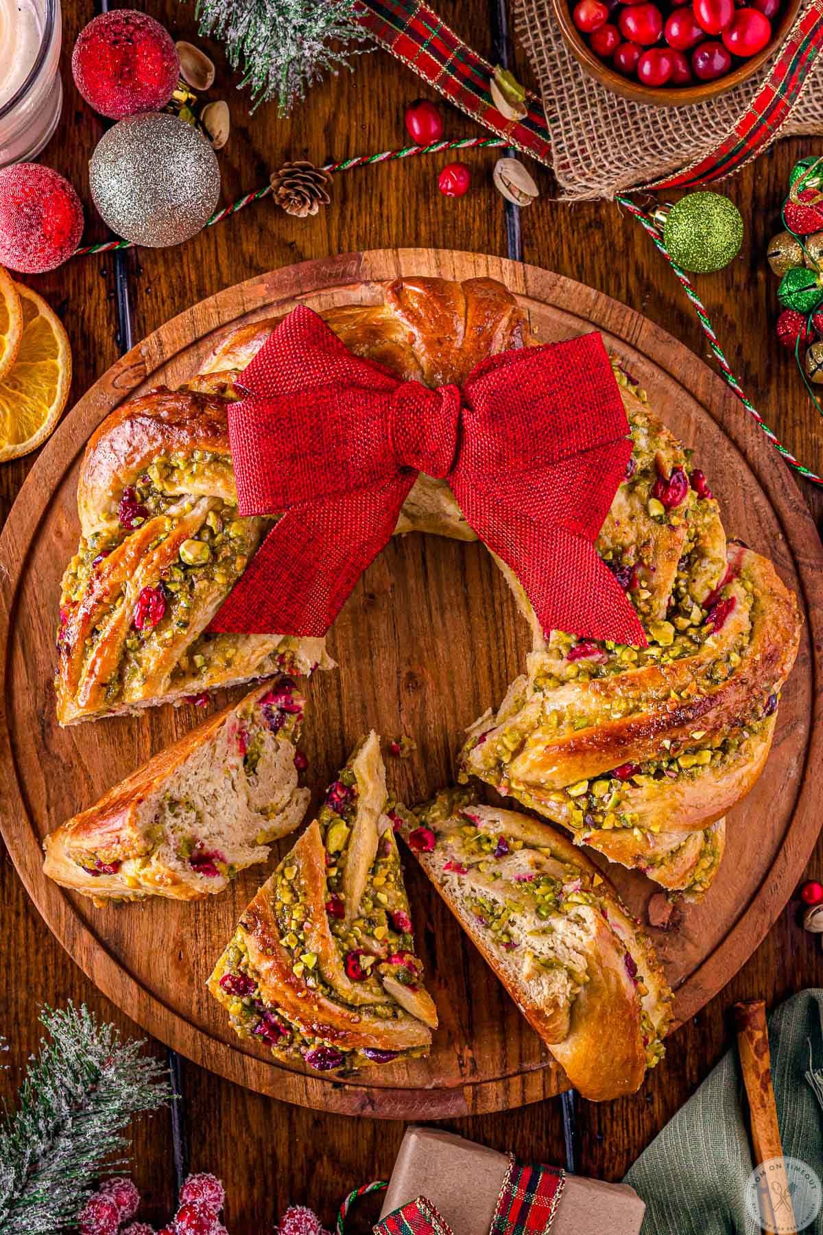 Whole babka wreath with three pieces cut out of the wreath.