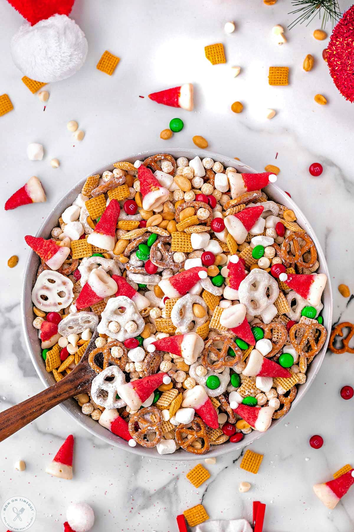 Overheat shot of santas holiday snack mix in large bowl. 