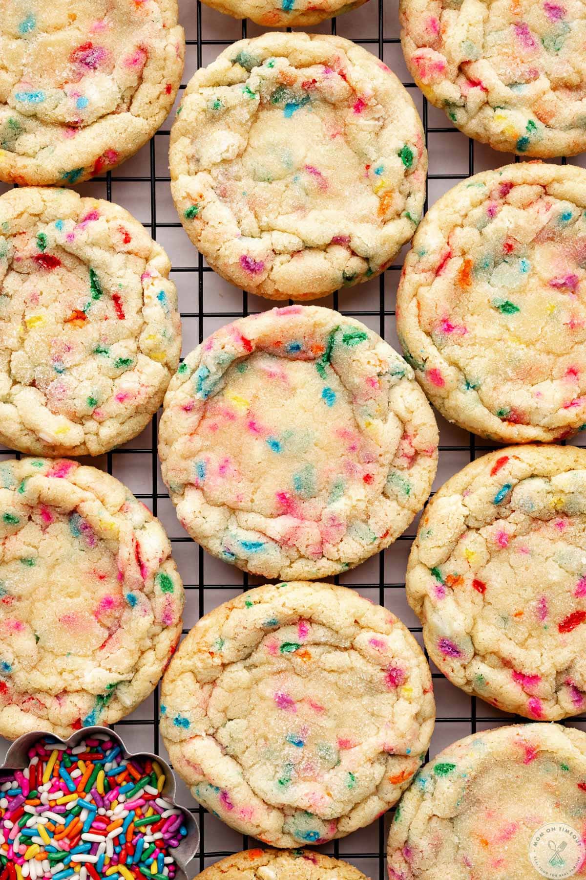 Funfetti cookies recipe baked and cooling on wire rack.