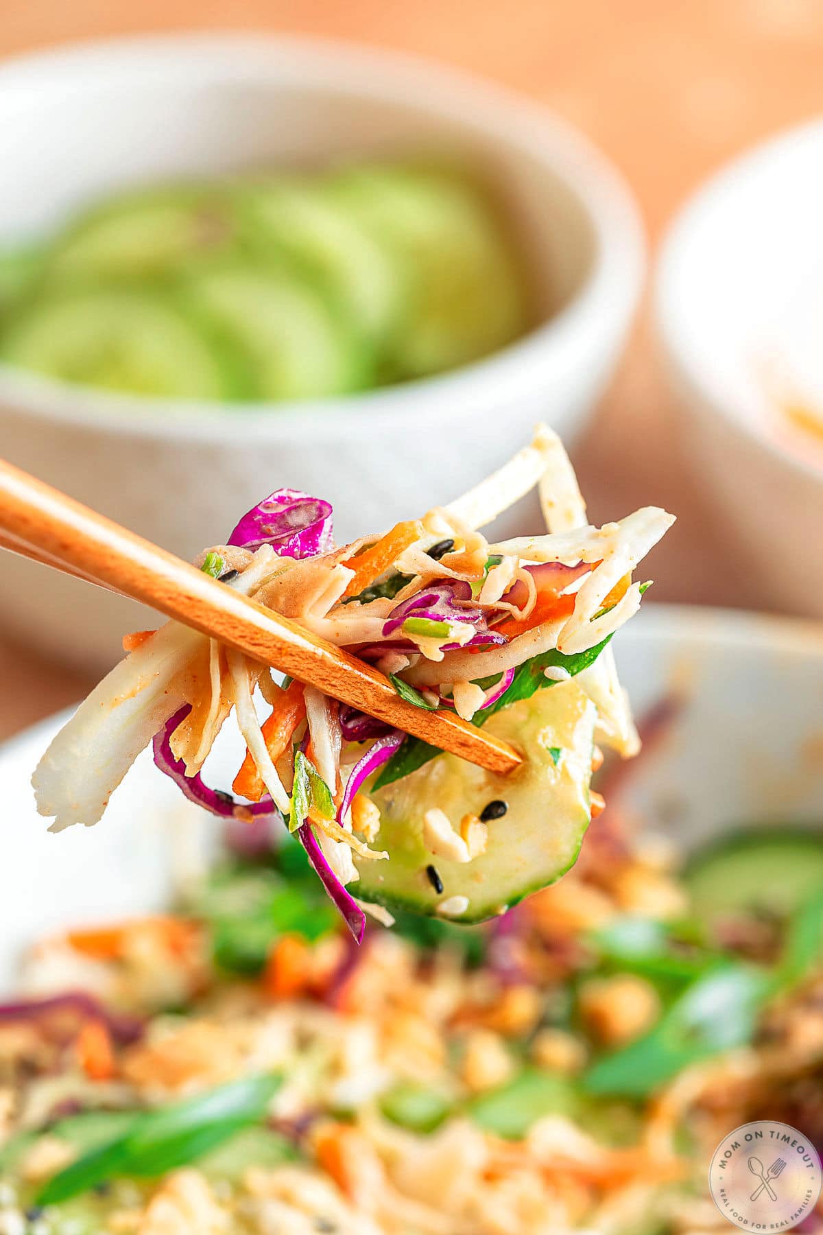 Thai salad recipe being eaten with chopsticks.